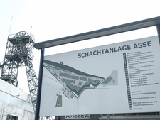 The information board at the entrance of the shaft depicts a map of the site.