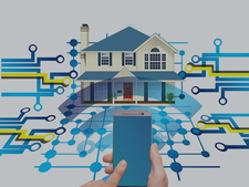 Smartphone im Vordergrund, im Hintergrund Haus Smartphone im Vordergrund, im Hintergrund Haus