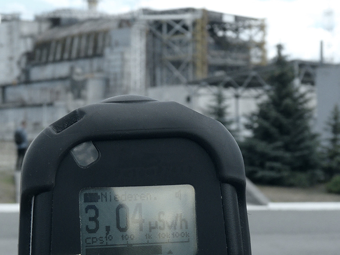 Handheld measuring device used to determine the ambient dose rate in front of the Chernobyl reactor. The display shows a value of 3.04 microsievert per hour. Handheld measuring device used to determine the ambient dose rate in front of the Chernobyl reactor. The display shows a value of 3.04 microsievert per hour.