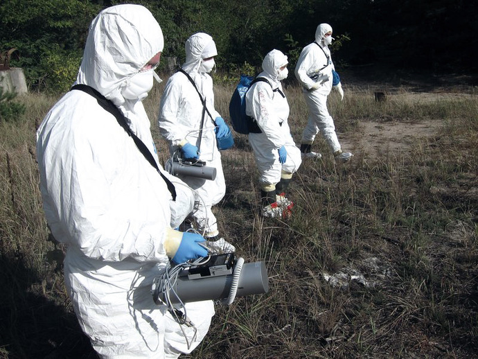 The team explores the terrain with portable ODL gauges The team explores the terrain with portable ODL gauges